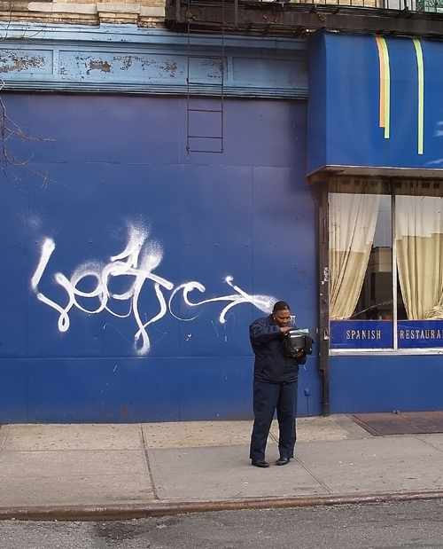 woman with graffiti near EL MODERNO