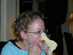 april putting a baby sock on her nose