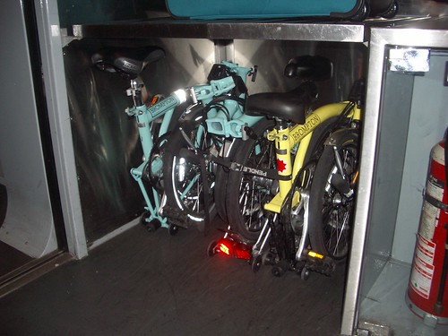 Folding bikes – pictured here on the Eurostar – fit easily into almost any train baggage area. They're also accepted as hand luggage on nearly all bus services. Photo: roggieLondon