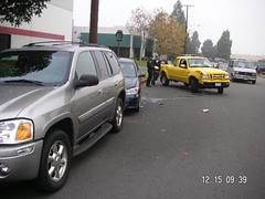 The yellow Ford hit the blue Camry into Tim's Envoy. (12/15/06)