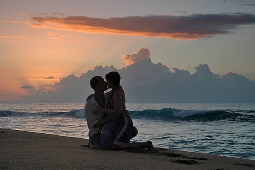 couple kissing sunset. A beautiful kiss in the sunset