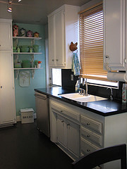 A window over the sink lets fresh light in, opening up the kitchen