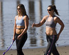 two-girls-exercising-cayucos-beach2 by mikebaird
