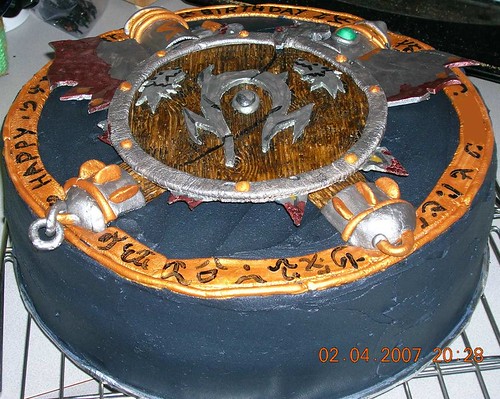 I was thinking of a world of warcraft themed wedding cake here's an idea 