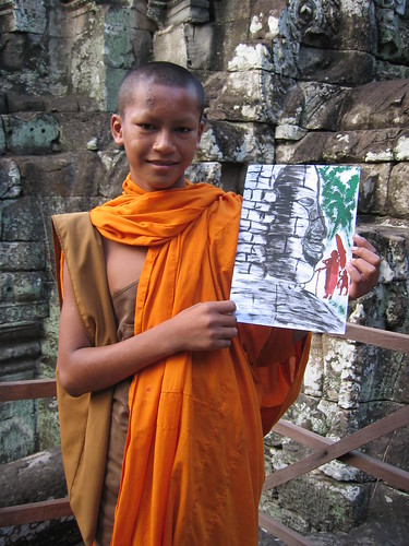 Monk and picture, Angkor Thom