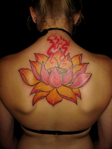 Beautiful Flower Tattoo Art in the back girl