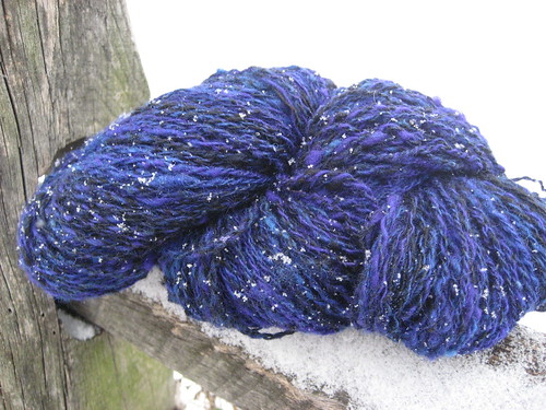 Blue yarn in snow