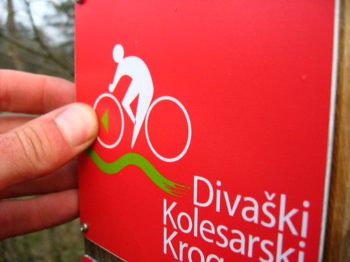 Microscopic bicycle route sign in Matavun, Slovenia