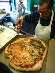 Image of DiFara making a pizza