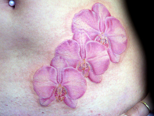 orchidee tatuaje Pupa Tattoo Granada