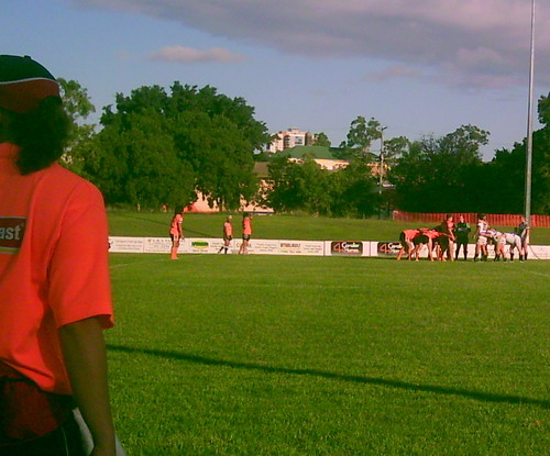 Scrum being packed while trainer watches – NRL trial game, Davies Park, West End, Brisbane, Queensland, Australia