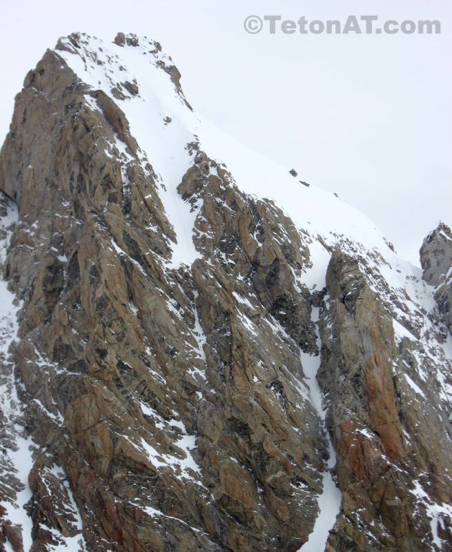Skier climbers ascend the Grand Teton
