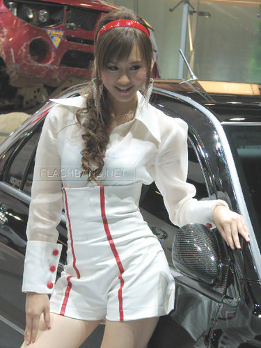Sweety Girl with Good Fashion in Racing Car Model