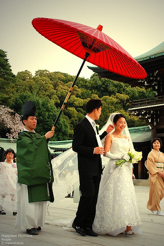happiest moment A wedding couple march their way to the altar inside the Meiji-Jingu Shrine.