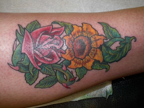 Flower In Hand tattoo womens