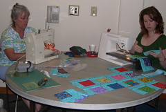 Ellena and Krista working on a charity quilt