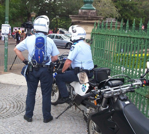 Police dirt bikes outside corner gate of Parliament House, Cnr George and Alice Sts - Invasion Day rally, Brisbane, Queensland, Australia-13