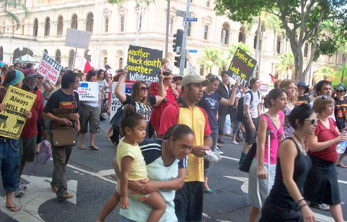 March heads up George St - Invasion Day Rally and March, Parliament House, George St, Brisbane, Queensland, Australia 070126