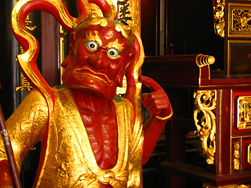 Red god statue, surprised