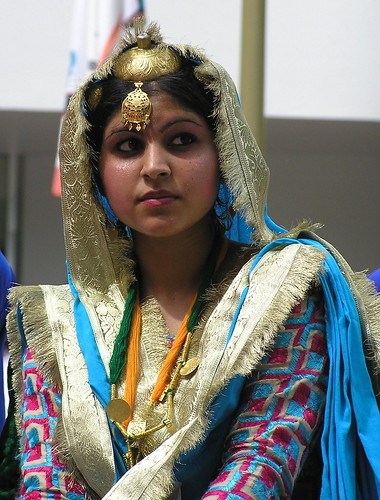 Punjabi Indian Bhangra dancer in traditional dance costume