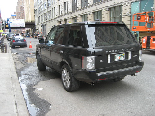 Range Rover parked 4 feet from the curb