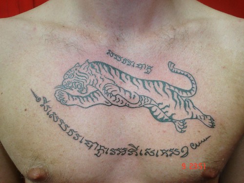 Thailand natural tiger and lettering chest tattoo