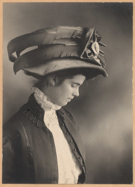 young victorian lady with a big fancy hat