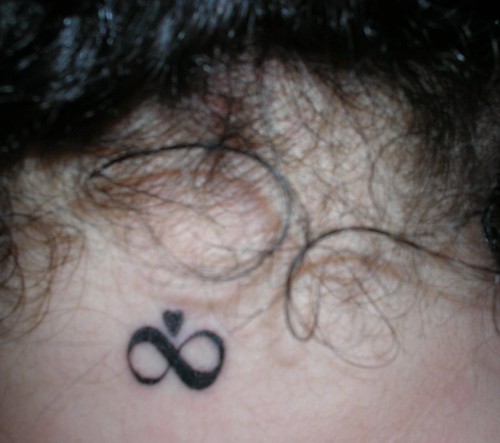 Tattoo on the back of my neck This is in memory of JJ a small heart above