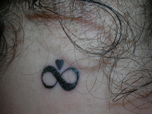 infinity sign. memory. neck. tattoo