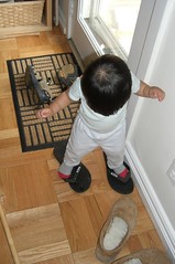 Trying on daddy's slippers