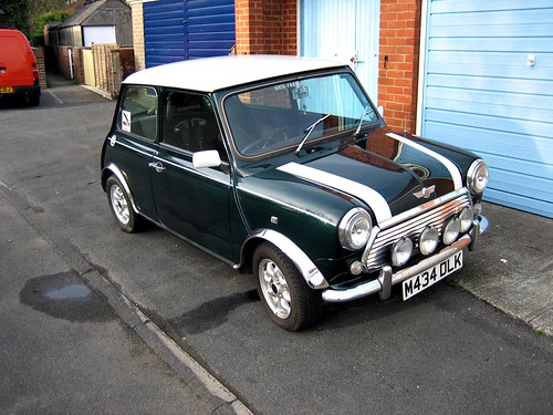I have a 1995 MINI Cooper in British Racing Green as my main mode of 