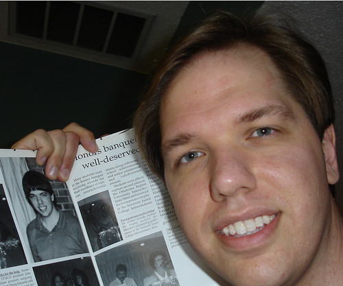 Posing with a yearbook picture of myself, by Billy Mabray, Creative Commons: Attribution 2.0.
