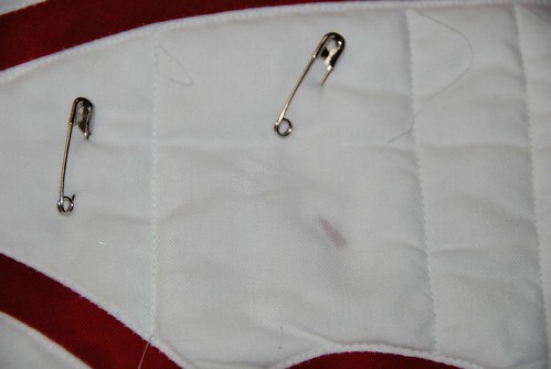 Piece of red fabric UNDER the white...