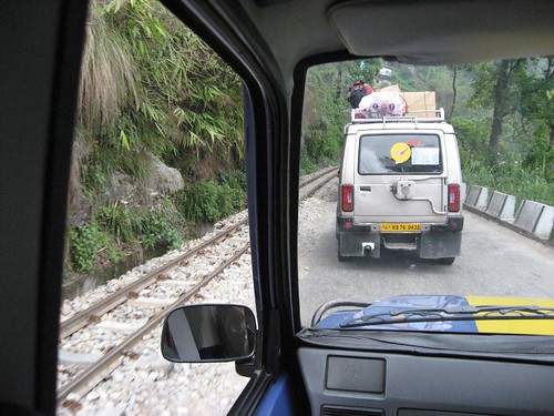 Train share the narrow roadways up the hill to Darjeeling