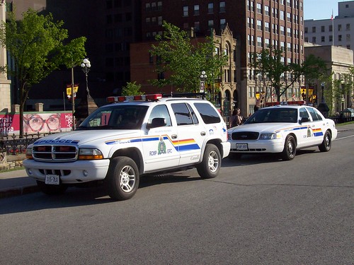 An RCMP Dodge Durango SUV and Ford Crown Victoria Police Interceptor