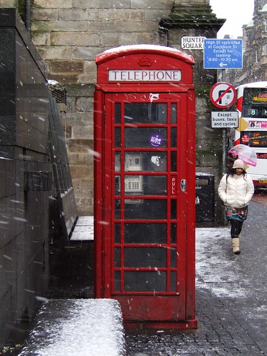old phone box in the snow