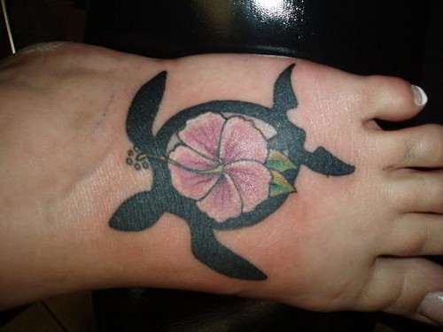 Honu with Hybiscus flower tattoo by Jon Poulson
