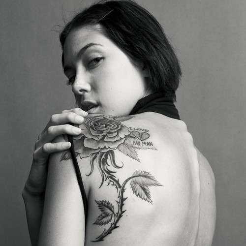 Rose tattoo designs show life, birth, procreation, 