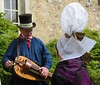 Norman folk costume coiffe hurdy gurdy