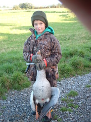 Sam, then aged 6, with a Greylag
