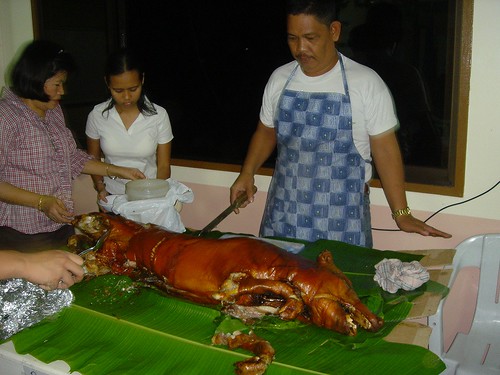 Philippines,Pinoy,Filipino,Pilipino,Buhay,Life,people,pictures,photos,food, man, lechon, traditional, roast pig celebration
