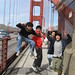 Cousins jumping on the Golden Gate Bridge