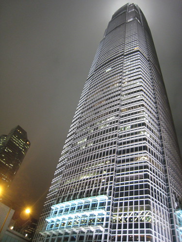 Hong Kong at night - looking up at a very well lit building