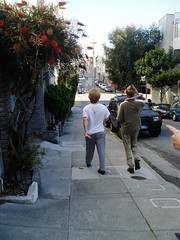 a photo of my friends walking down a street in San Francisco