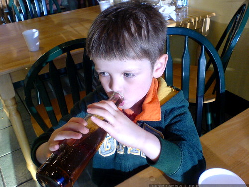 nick and his first bottle of soda pop - DSC00162