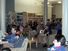 Crowd watching Coffeehouse @ the Library performer