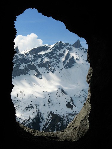 A hole in the wall in tunnel leading up to Col du Sanetsch, Switzerland
