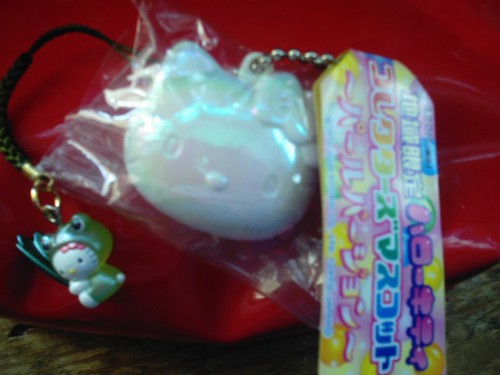 The Hello Kitty Frog. hello kitty oyster keyring and frog charm. The charm came inside the keyring