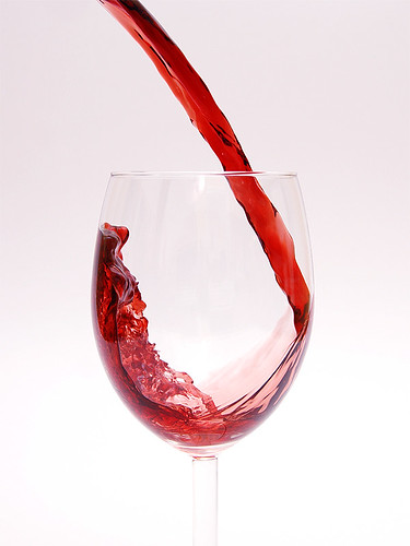 red wine glass. Red wine into glass