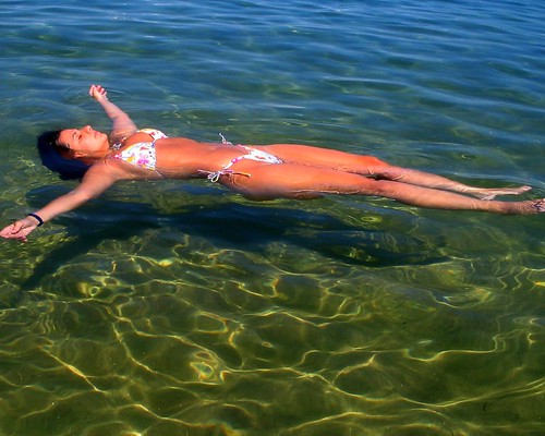 Floating bikini woman